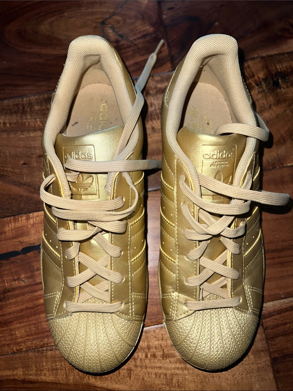adidas Women’s Metallic Gold Superstar Sneakers